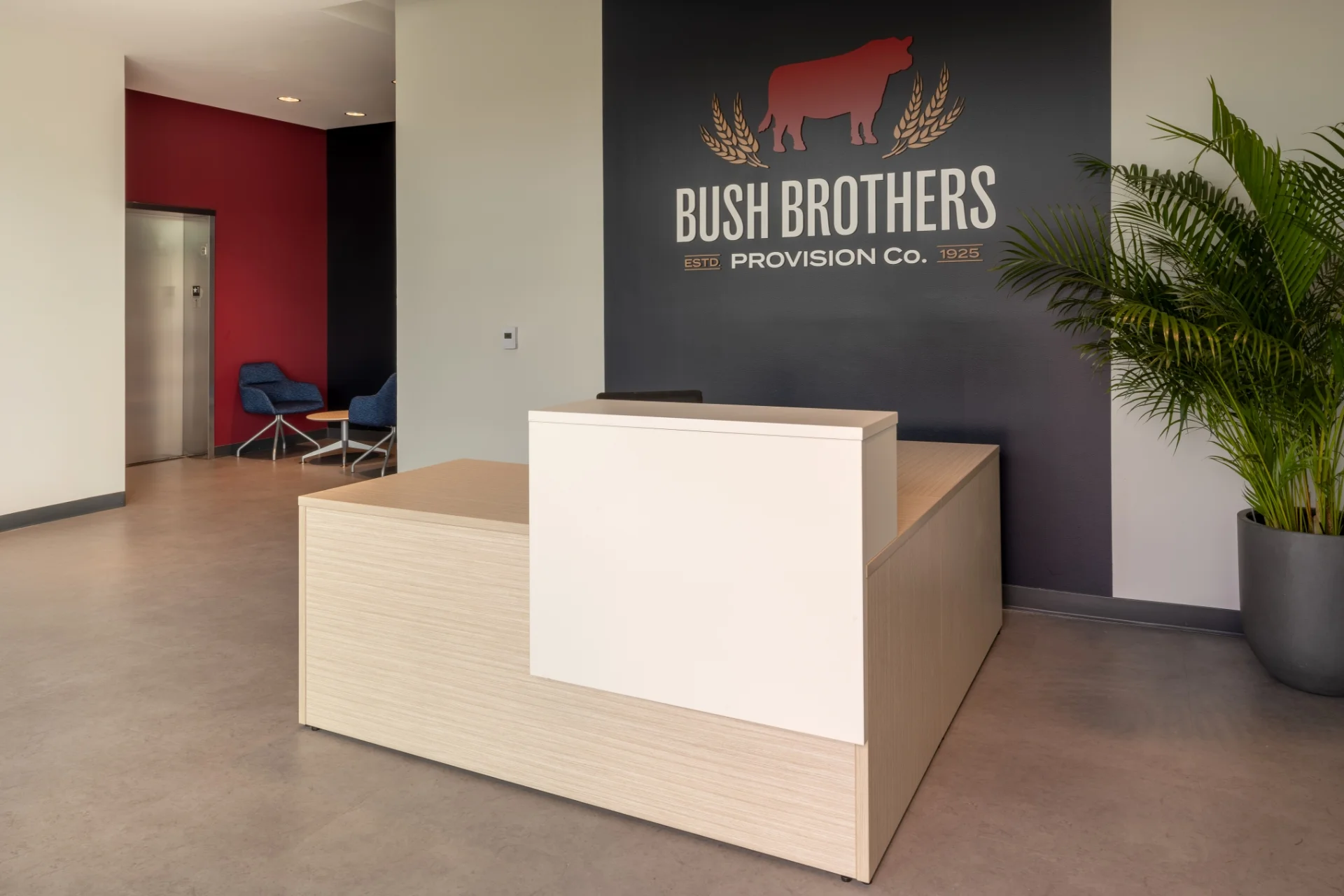 reception desk with company signage