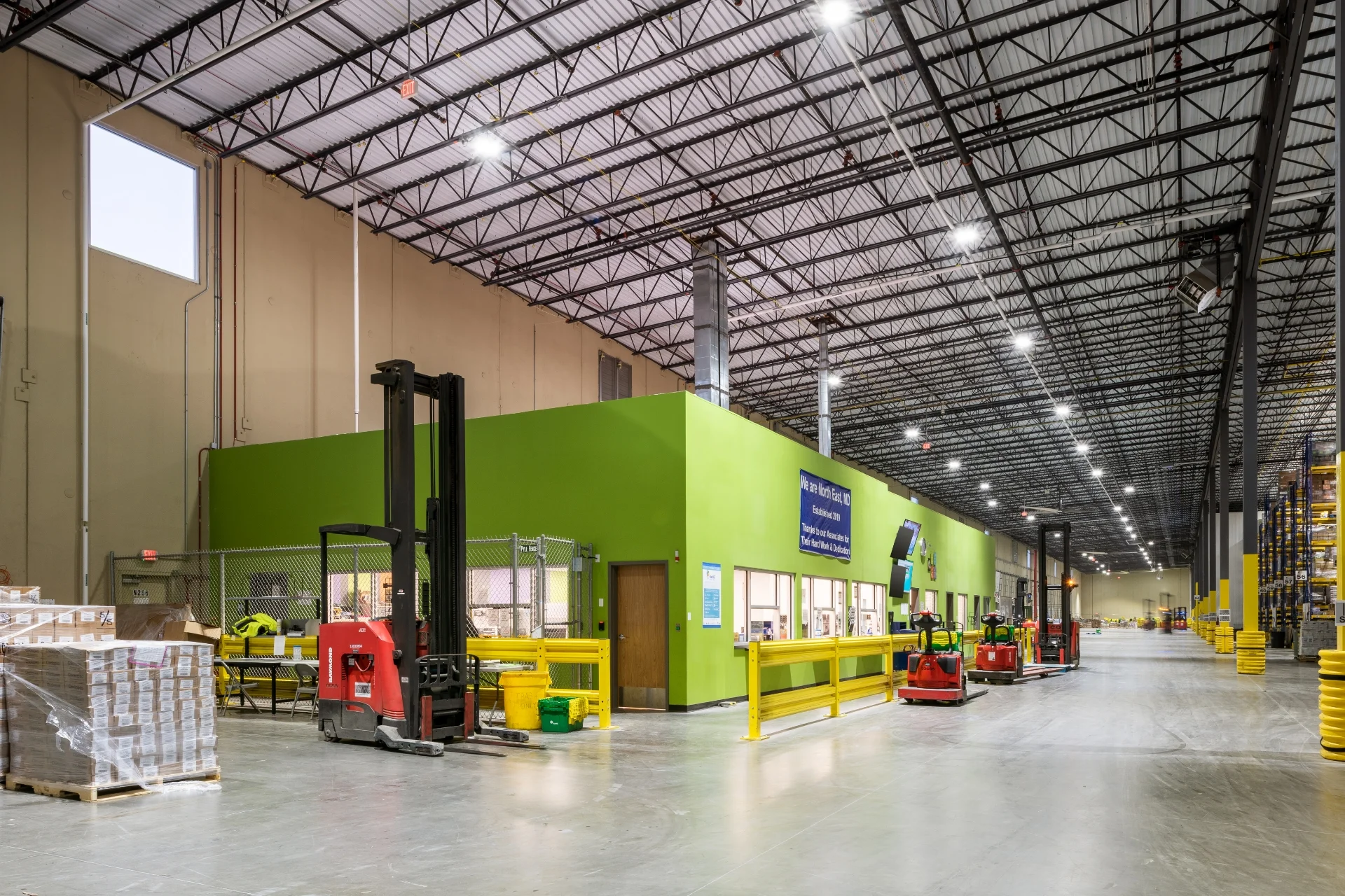 warehouse floor and green office walls